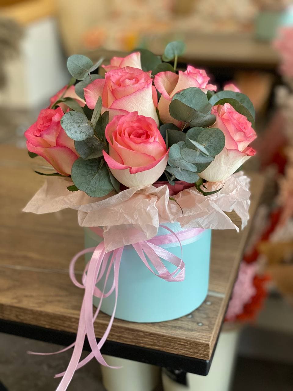 Roses in a box "9 Jumilia with eucalyptus"