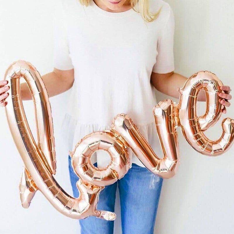 Foil balloon "Inscription love. Rose gold"