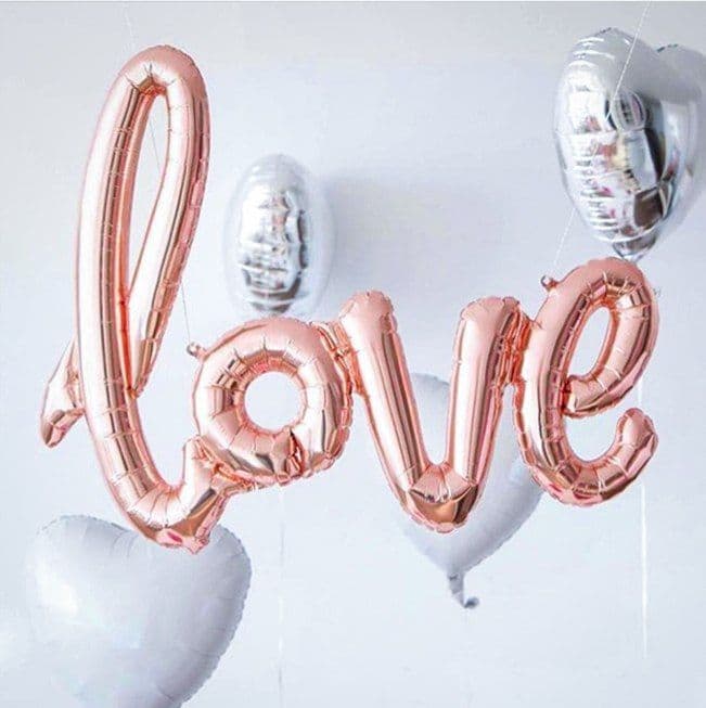 Foil balloon "Inscription love. Rose gold"