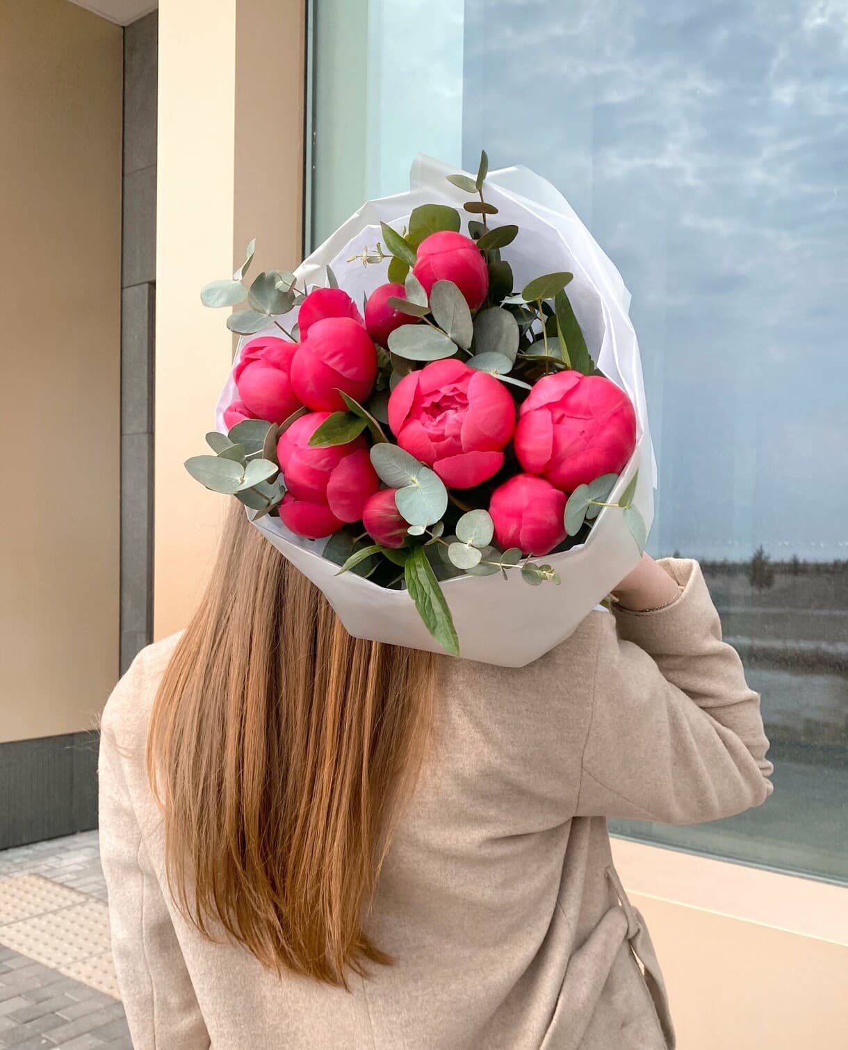 Bouquet of peonies "9 Coral Charm with eucalyptus"