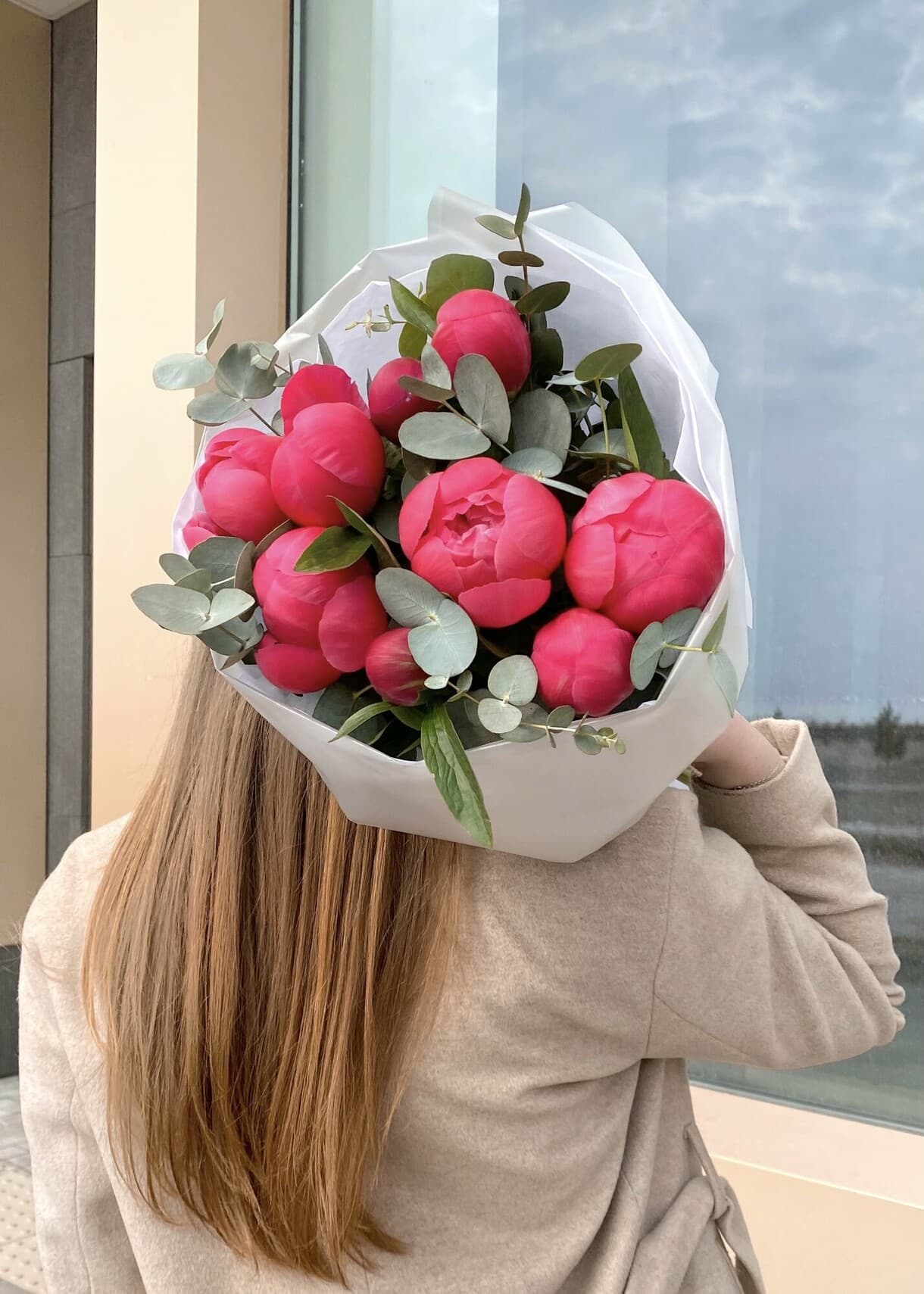 Bouquet of peonies "9 Coral Charm with eucalyptus"