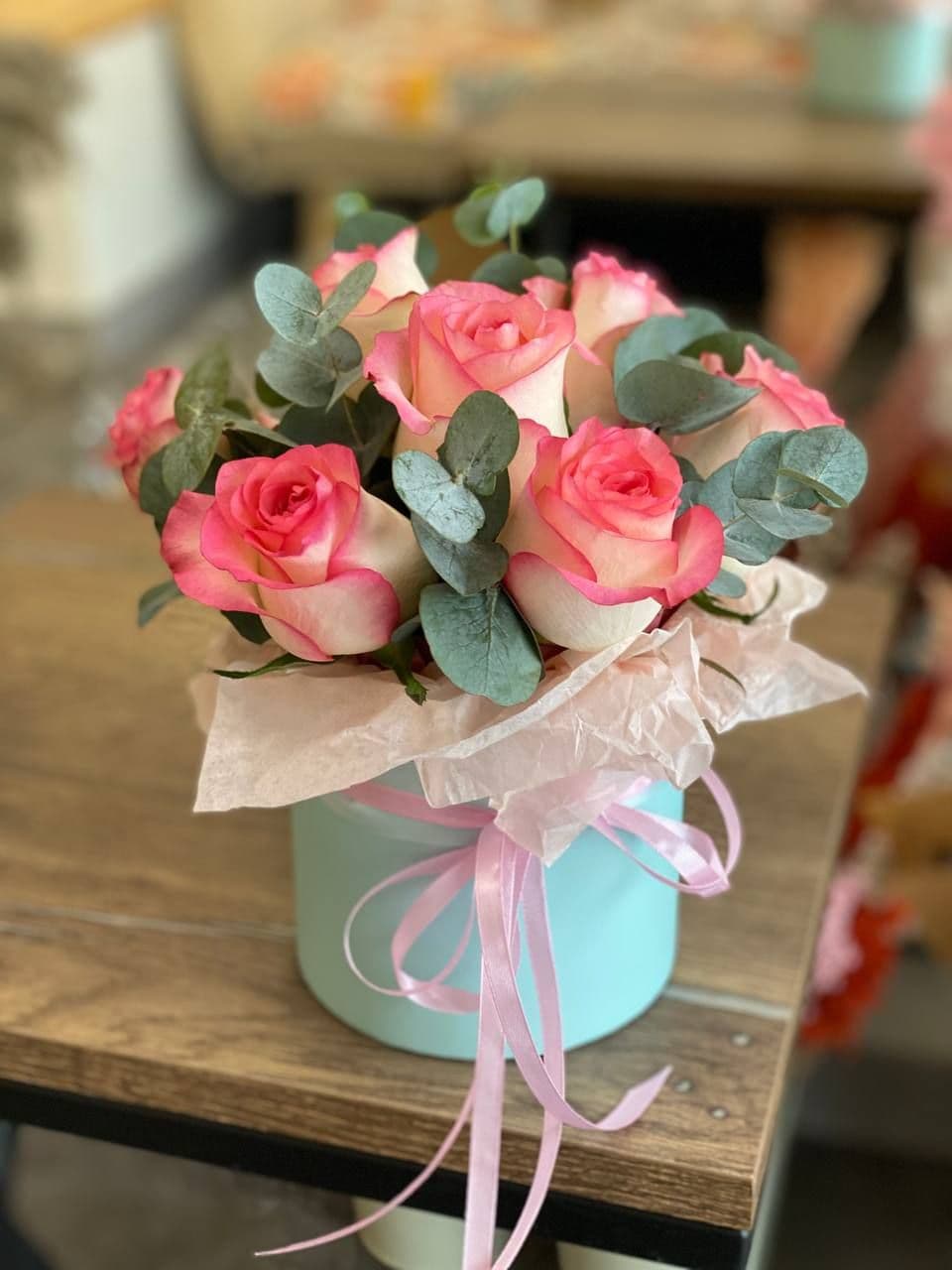 Roses in a box "9 Jumilia with eucalyptus"