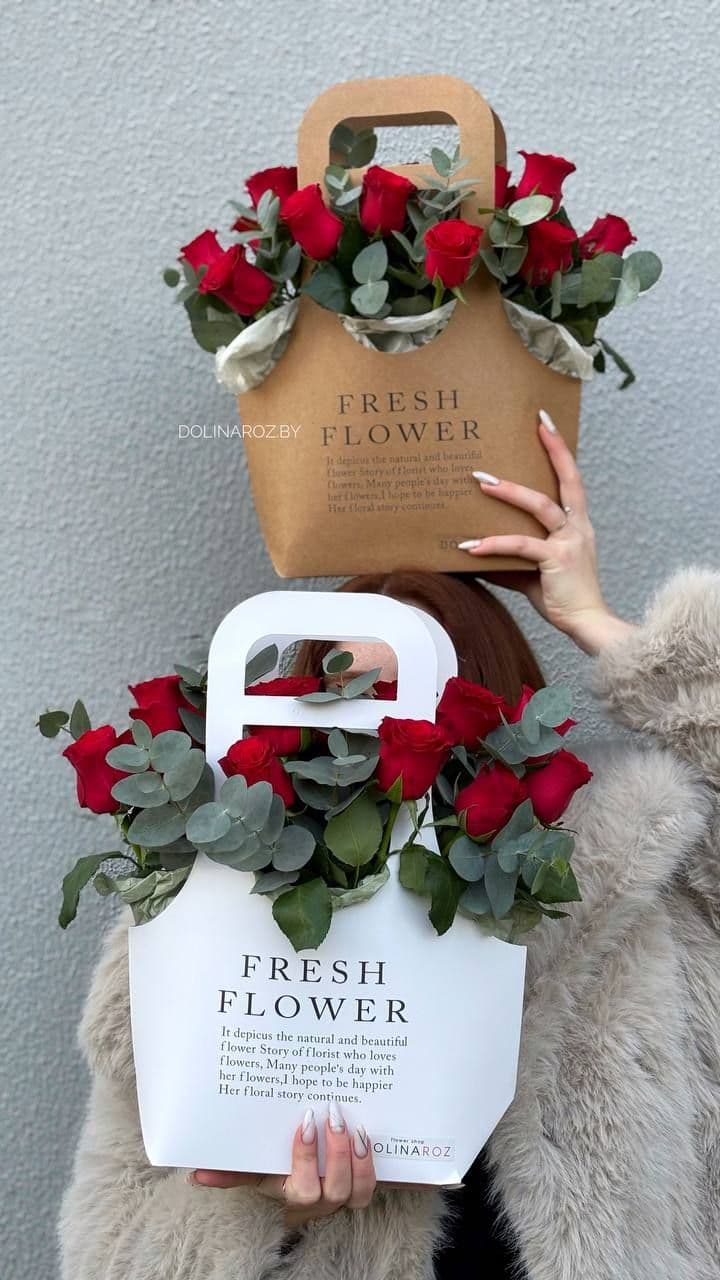 Arrangement "Red Roses and Eucalyptus. White Bag"